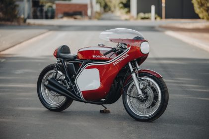 Landscape photo of a Honda CR750 motorcycle parked in the street